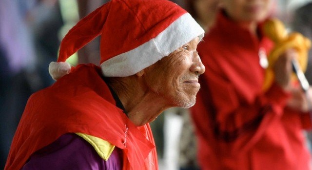 Why is Santa Claus knitting in China ?